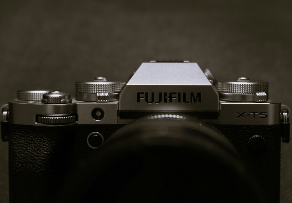 a black and white photo of a camera